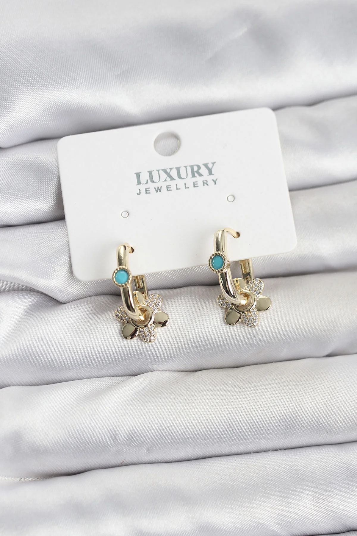 Mavi Taş Detaylı Pirinç Gold Renk Kadın Göçmen Küpesi